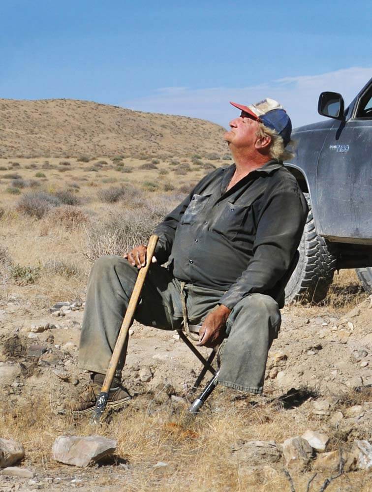 Legendary Nevada prospector Peg Leg John enjoys the summer sun during a GPAA outing at Rye Patch State Recreation Area.