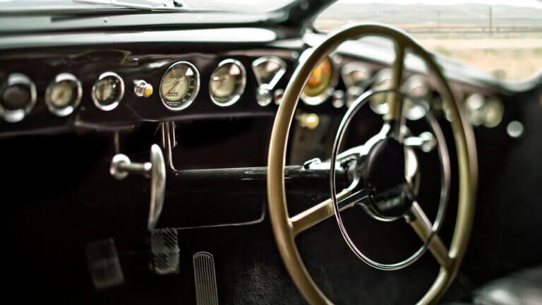 steering column of a classic car at the national automobile museum