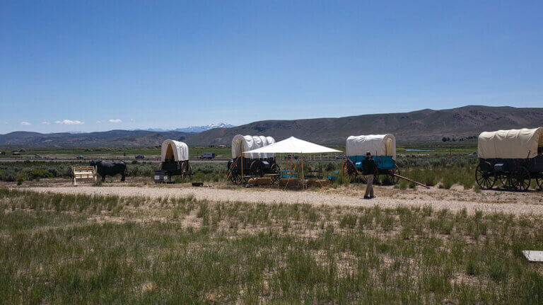 covered wagons outside california trail interpretive center in elko nevada