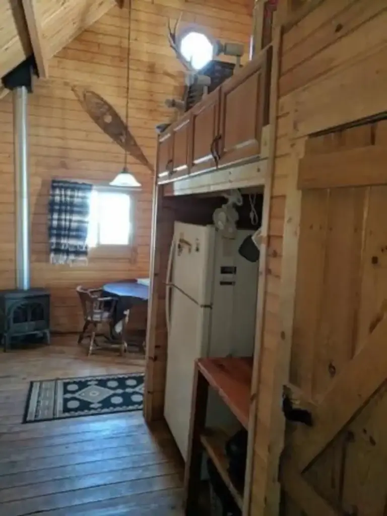 refrigerator and kitchen at old yella dog ranch and cattle company