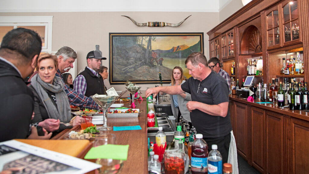 guests at bar top of oats park art bar