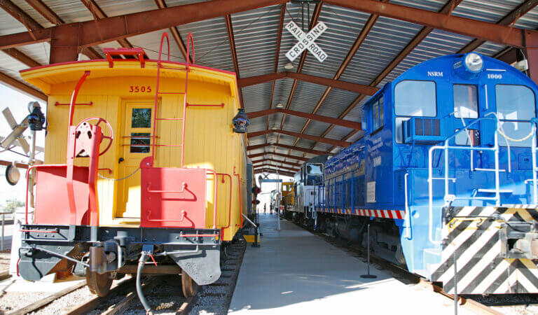 rail cars at the nevada state railroad museum in boulder city