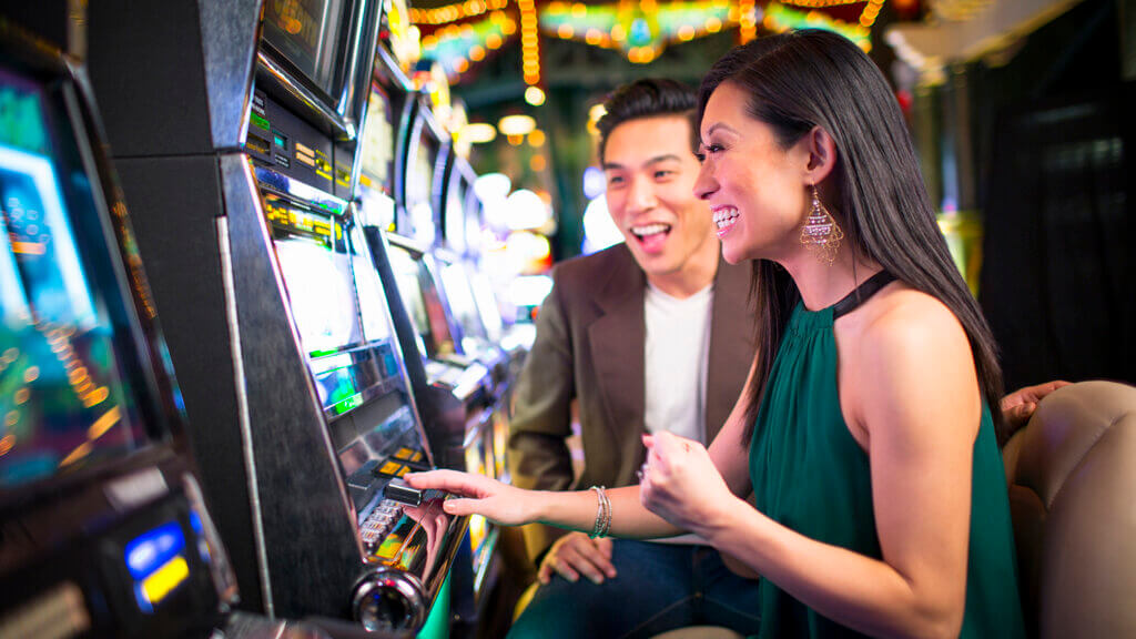 couple gambling at the silver legacy casino