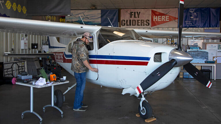 mechanic working on airplane