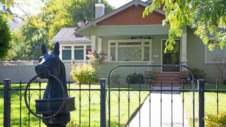 house with fence in front