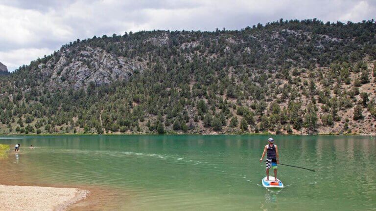 paddle boarding at cave lake