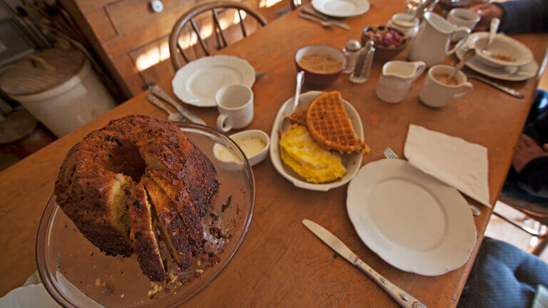 breakfast dish with some eggs and waffles