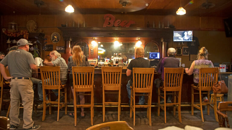 people at bar in mozart tavern