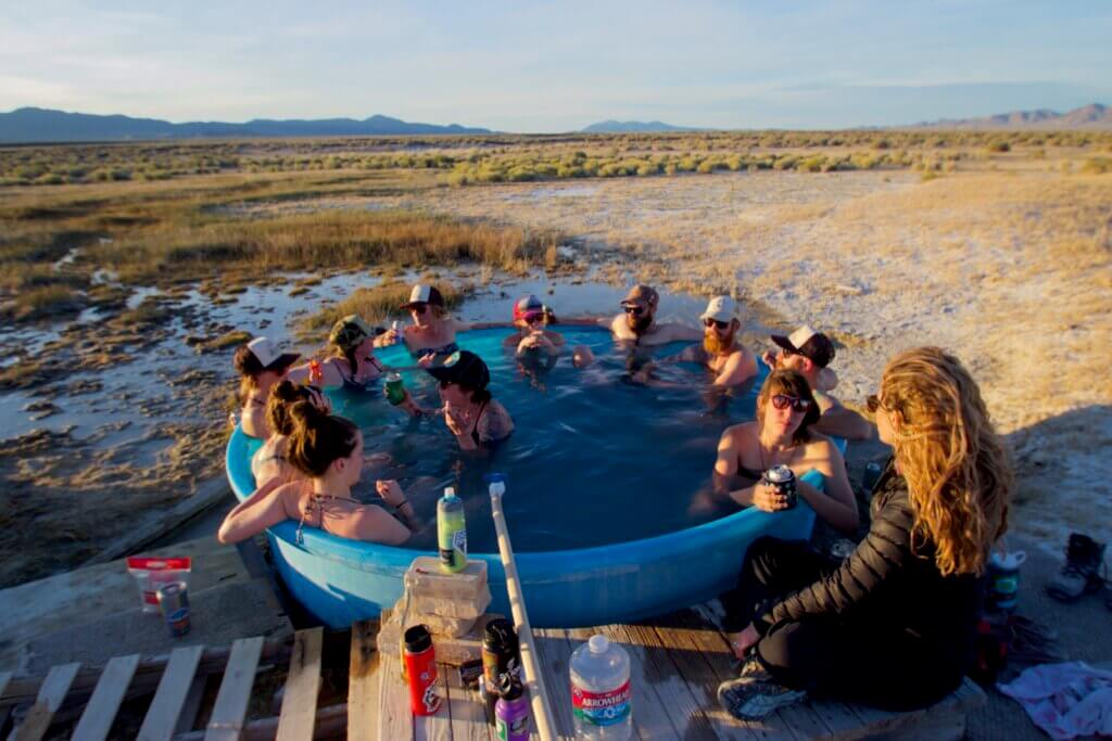 group of people enjoying a hot spring