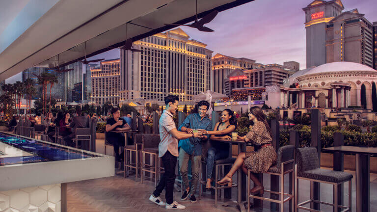 bar full of guests at the linq hotel and experience