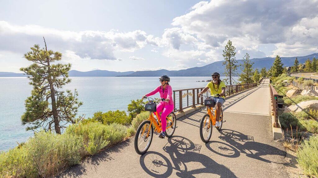 couple biking at tahoe east shore trail