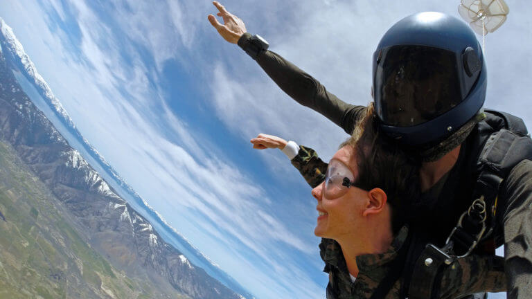 tandem skydivers over lake tahoe