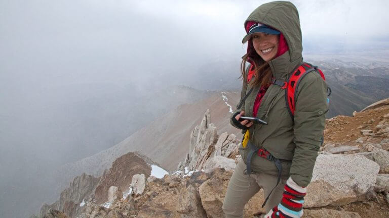 hiker on top of boundary peak