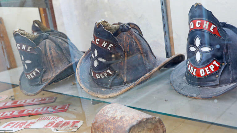 old fire hats at million dollar courthouse