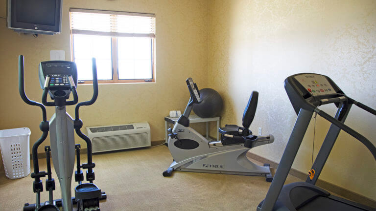 gym at silverland inn suites