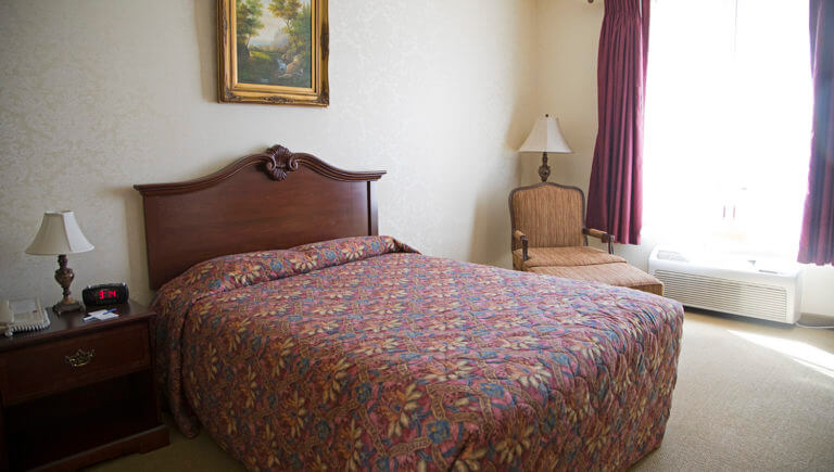 bed at silverland inn suites