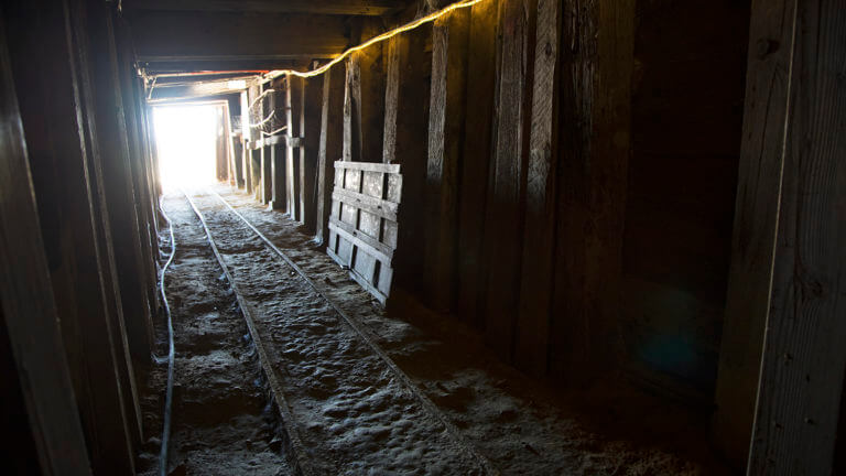 light shining into the chollar mine