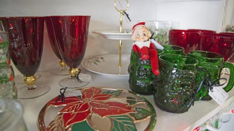 elf on a shelf and assorted christmas glassware