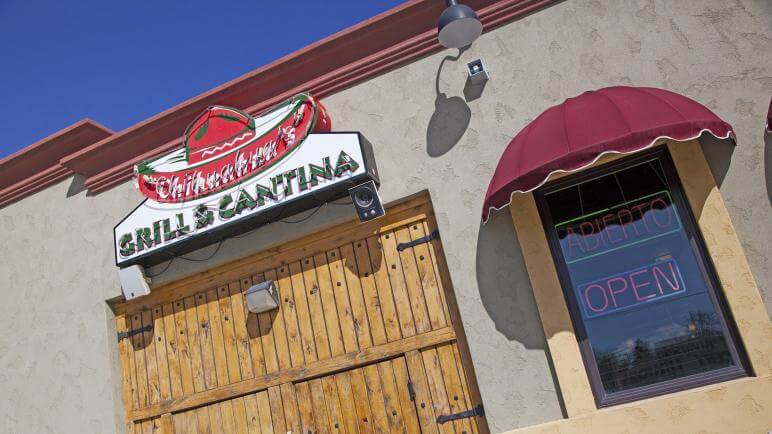 wooden door entrance to chihuahuas restaurant