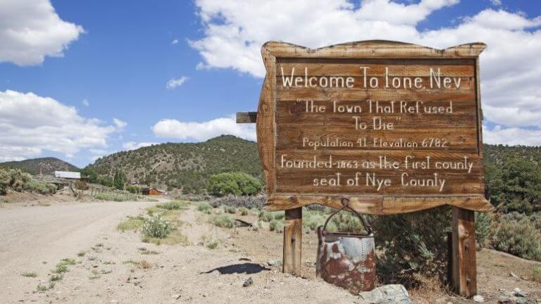 welcome sign to ione ghost town