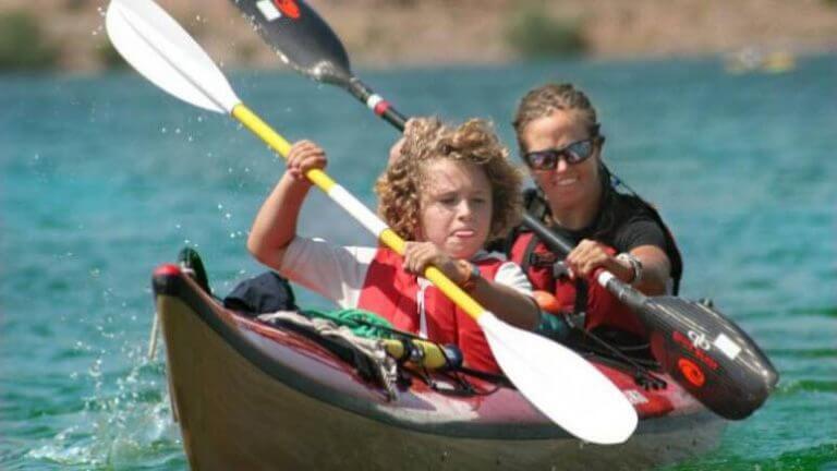 couple paddling in a canoe