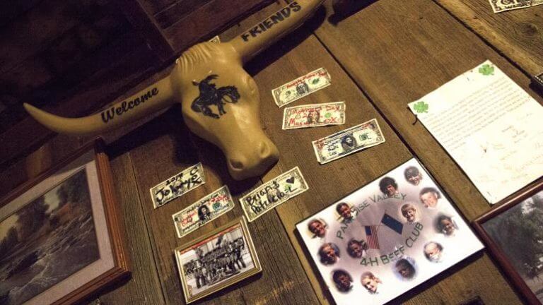 bull skull and signed bills at the paradise valley saloon