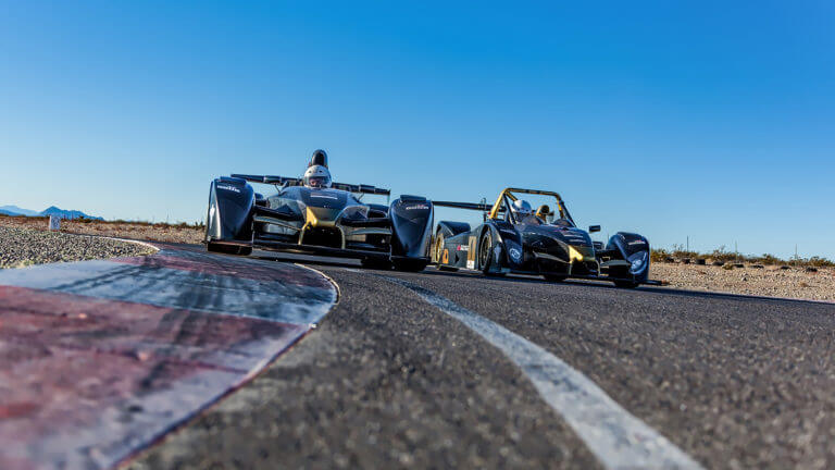 f1 cars racing on a track