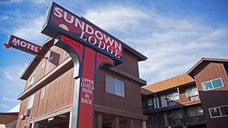 sign and front office of the sundown lodge