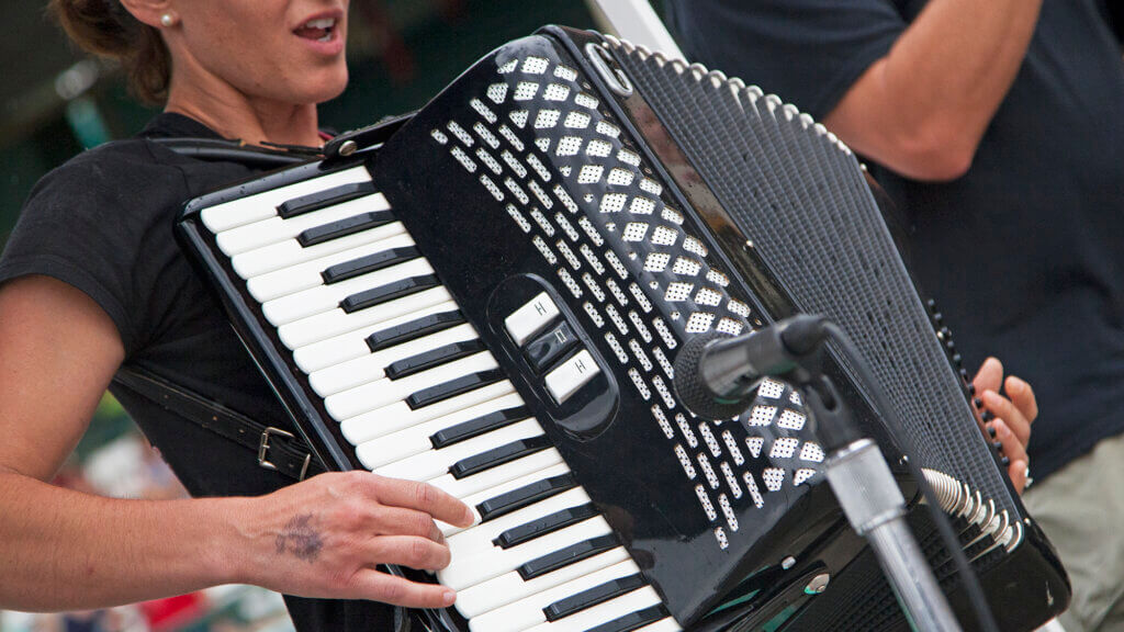 woman playing the accordion