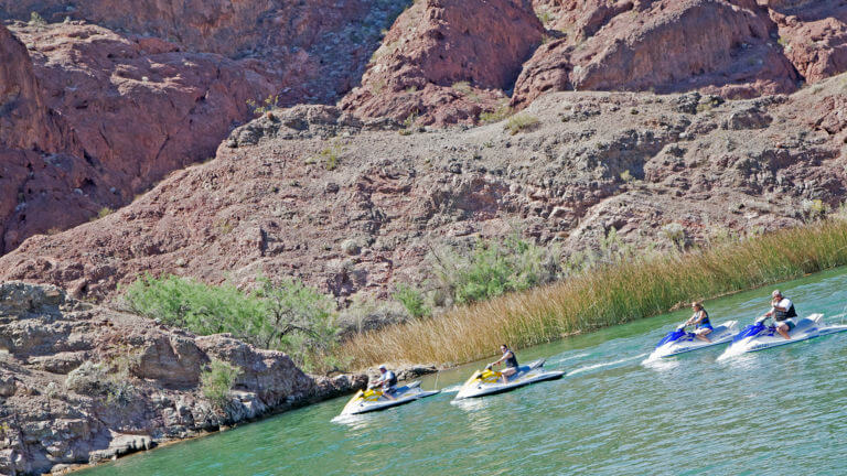 jet skiers on lake