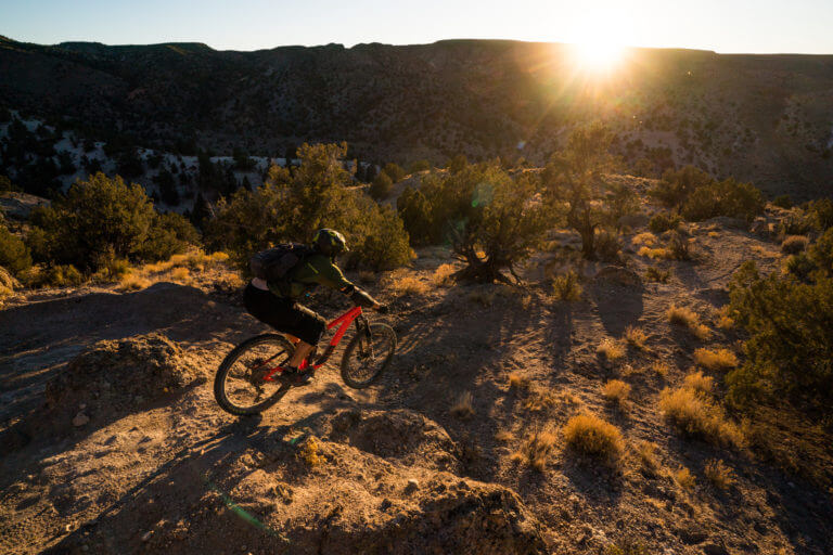 mountain biking during the sunset