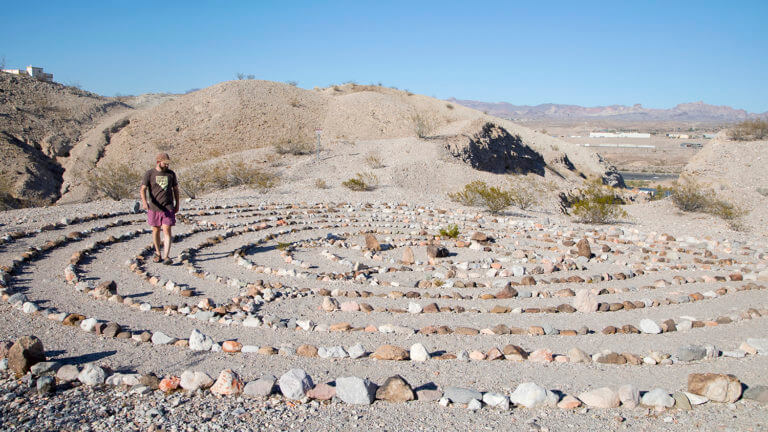 man in laughlin rock labyrinth