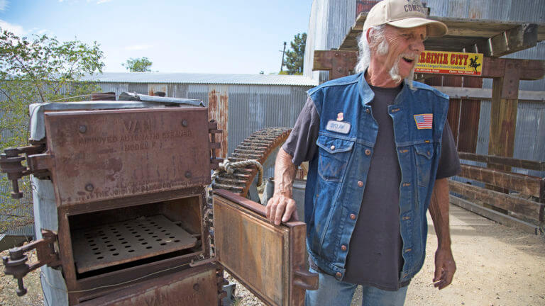 man at comstock gold mill