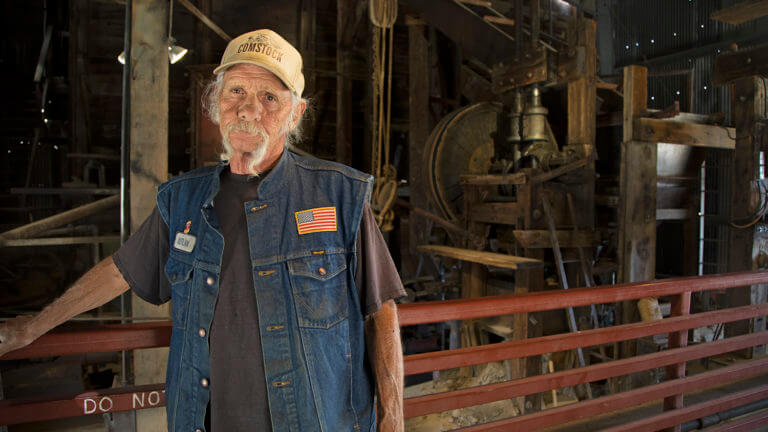 man at comstock gold mill