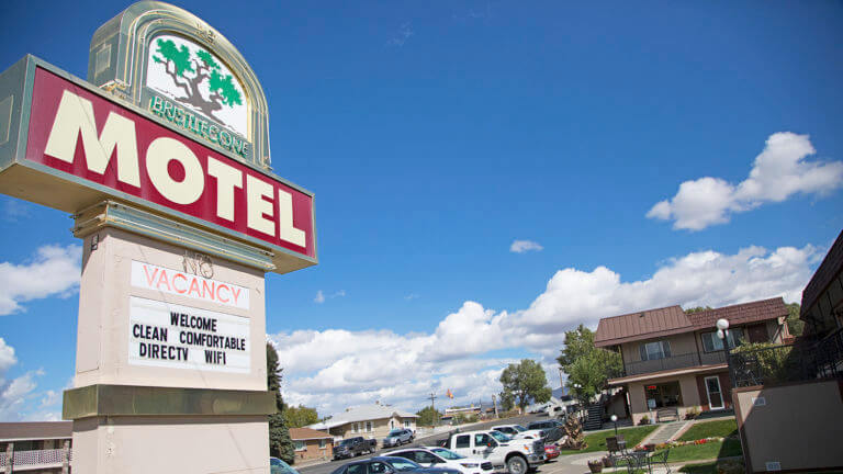 sign for the bristlecone motel