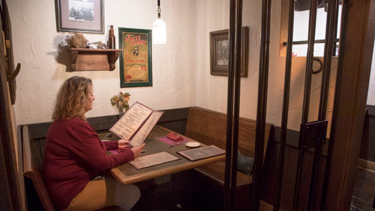 woman reading menu