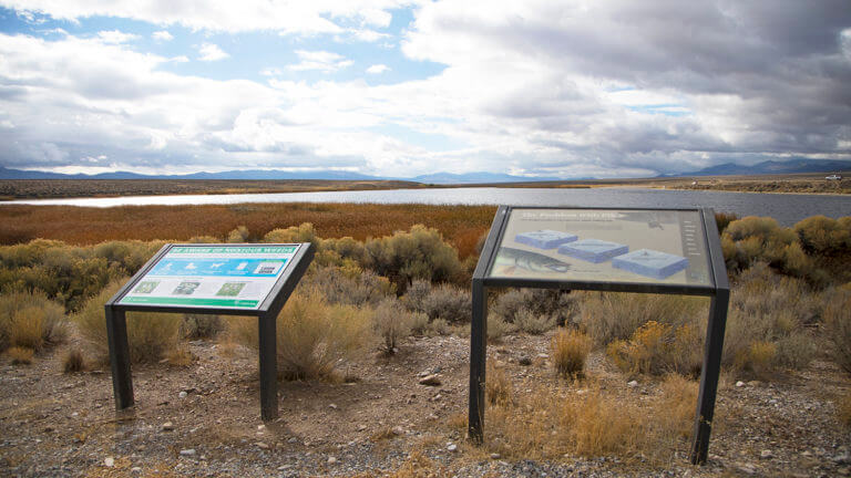 informational signs at comins lake
