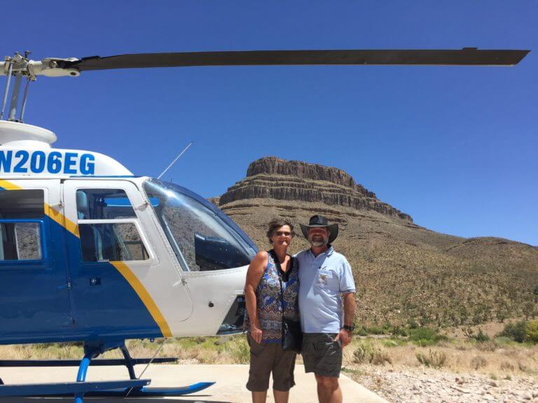 couple in front of Wild West Helicopters