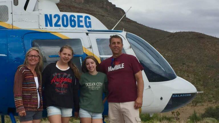family after Wild West Helicopters tour