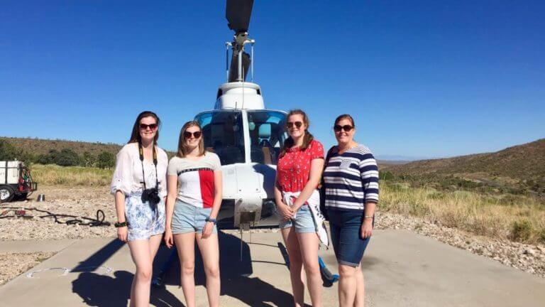 Family in front of Helicopters