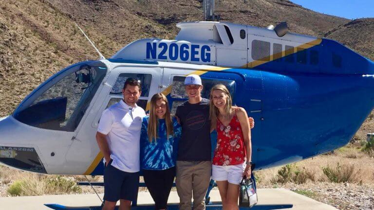 Family in front of Wild West Helicopters