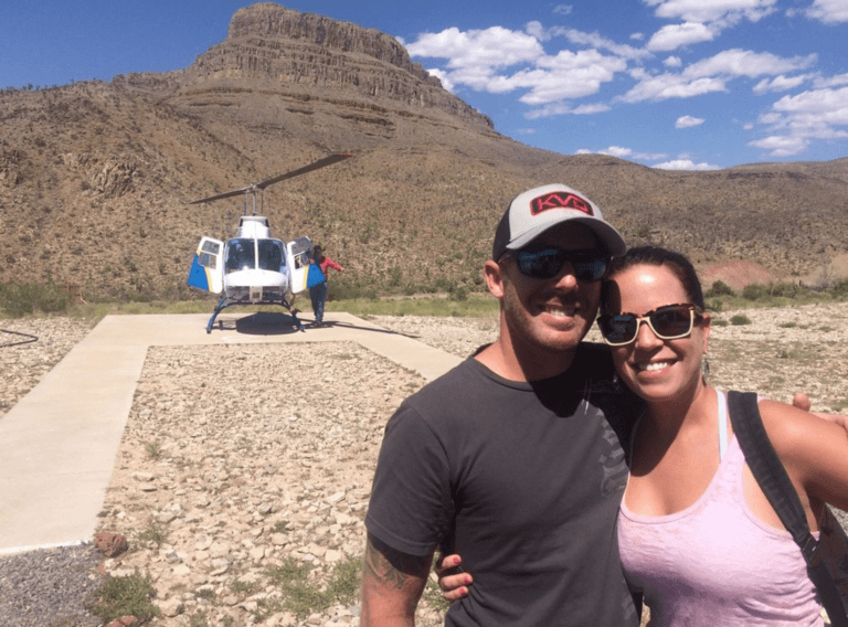 couple after Wild West Helicopters tour