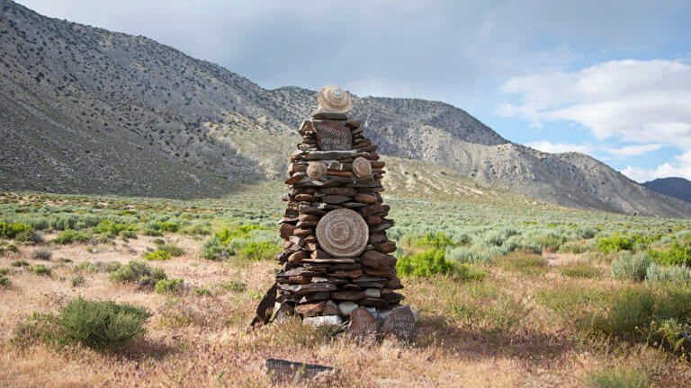 stacked rocks art guru road