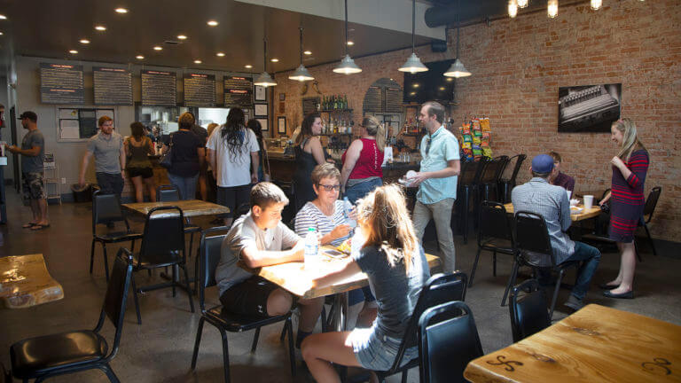 guests dining at the ogi deli bar and pintxos