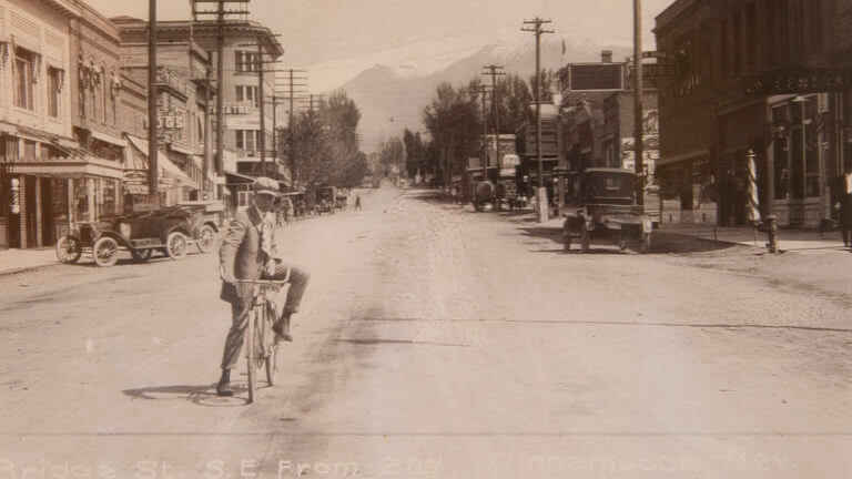 man walking in accross street in pictures