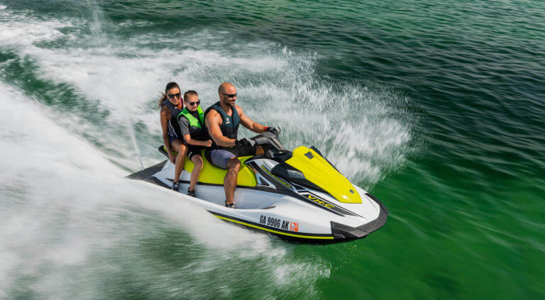 family on a jet ski