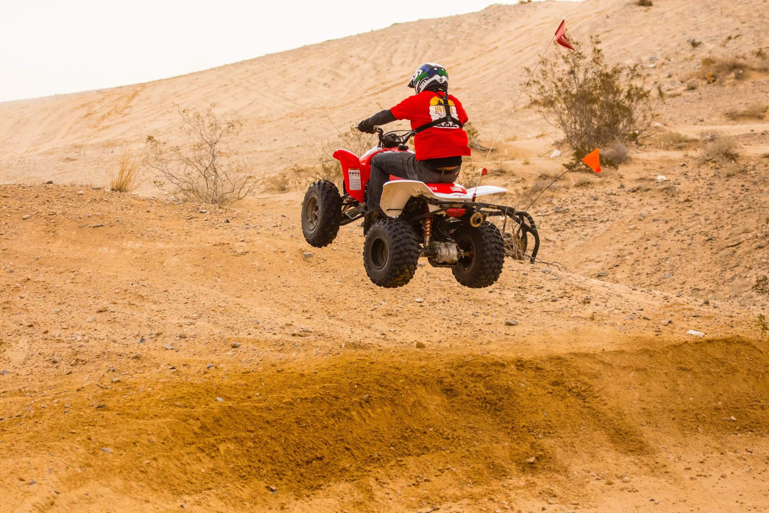 man on an atv in the air