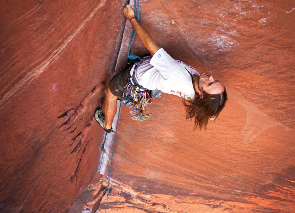man rock climbing at calico basin