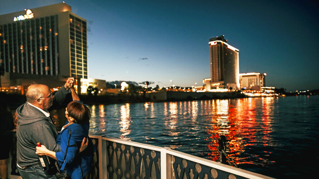 couple dancing on the river boat dinner cruise