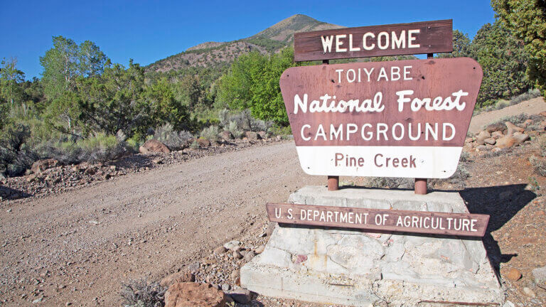 pine creek campground welcome sign